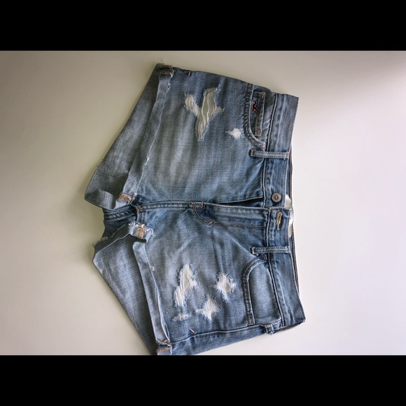 Hollister Pants - Super high waisted distressed denim shorts.